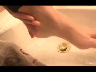 Chloe petite attractive amateur blonde washing ang licking feet in bathroom
