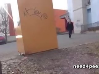 Amateur damsel Hides Behind A Wall To Take A Pee